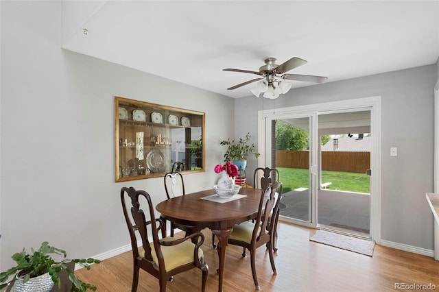 6040 Taft Ct, Arvada, CO 80004 - dining area with baseboards, wood finished floors, and a ceiling fan