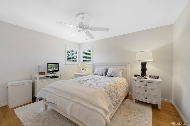 6040 Taft Ct, Arvada, CO 80004 - bedroom with light wood-style flooring, baseboards, and ceiling fan