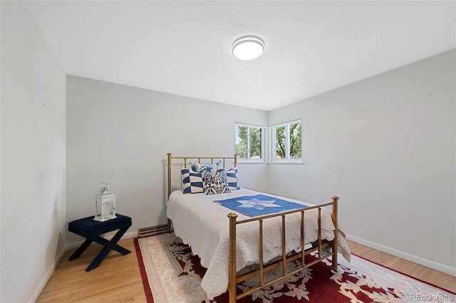 6040 Taft Ct, Arvada, CO 80004 - bedroom featuring light wood-style flooring and baseboards