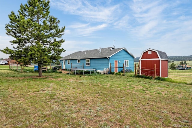 406 High Pasture Rd, Florissant, CO 80816 - rear view of property with a barn and an outbuilding