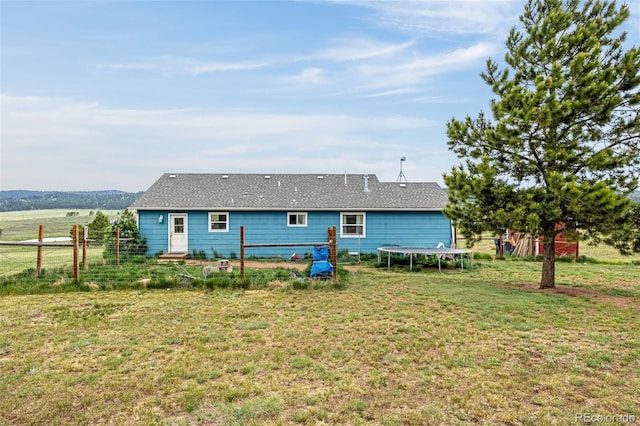406 High Pasture Rd, Florissant, CO 80816 - rear view of house with a trampoline