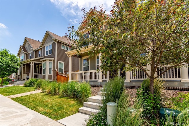 14065 Harrison St, Thornton, CO 80602 - view of front of house with covered porch