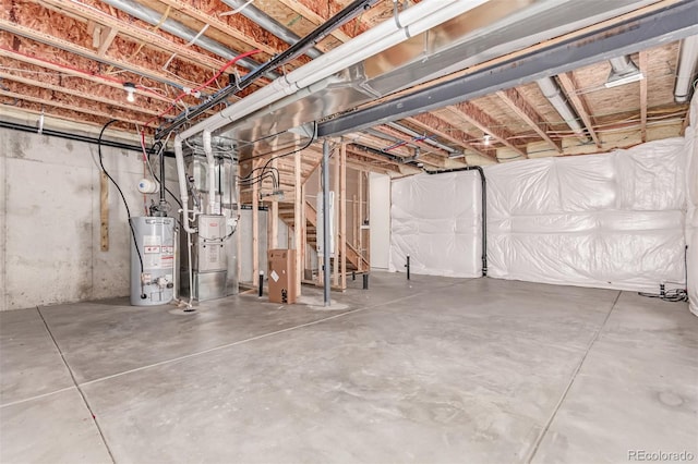 14065 Harrison St, Thornton, CO 80602 - unfinished basement with gas water heater and stairs