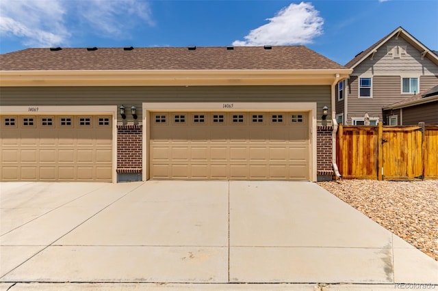 14065 Harrison St, Thornton, CO 80602 - ranch-style home featuring brick siding, roof with shingles, and driveway