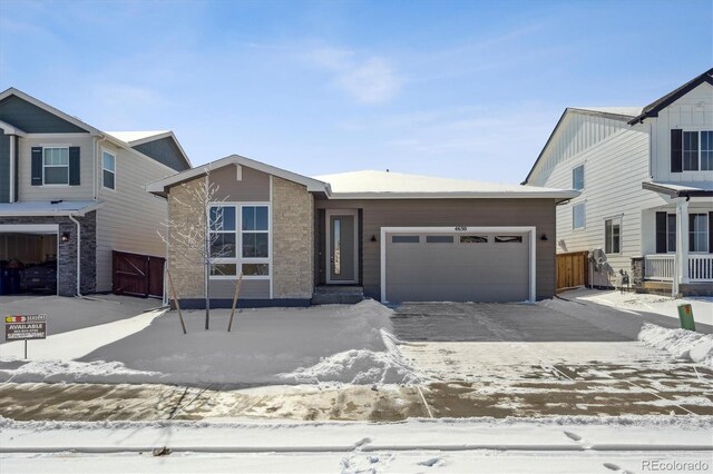 view of front of property with a garage