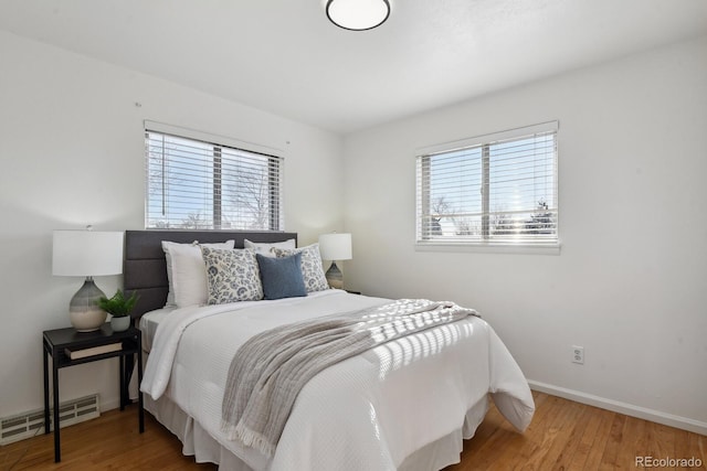 bedroom featuring hardwood / wood-style flooring