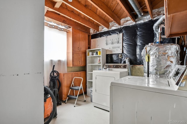 washroom with separate washer and dryer