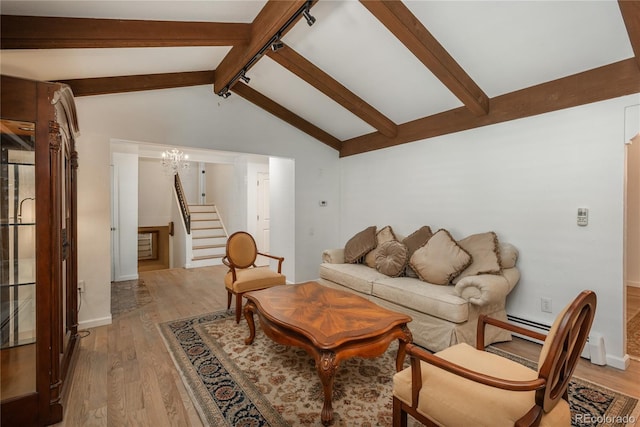 living room featuring light wood-type flooring, stairs, a chandelier, and baseboards