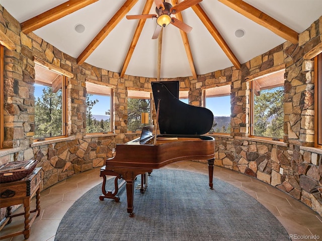 29548 Sunset Trl, Pine, CO 80470 - home office with high vaulted ceiling, ceiling fan, stone finish floor, and beamed ceiling