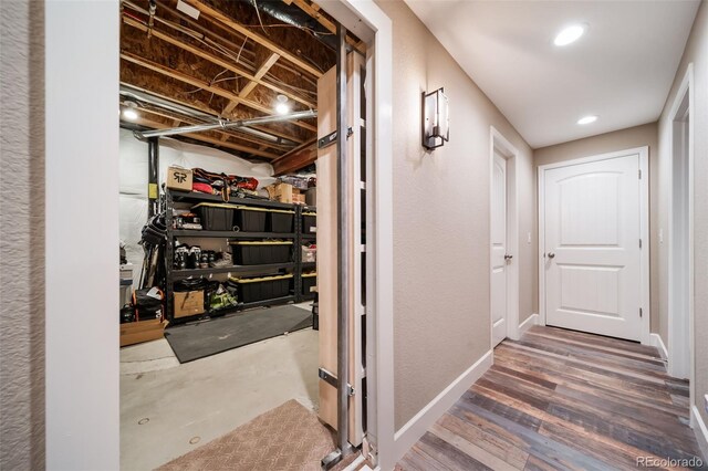 hallway featuring dark wood-type flooring