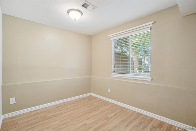 4947 S Espana Way, Centennial, CO 80015 - empty room with wood finished floors and baseboards