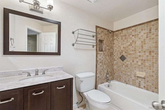 4947 S Espana Way, Centennial, CO 80015 - bathroom featuring vanity and bathing tub / shower combination