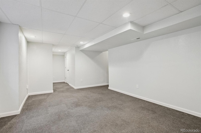 4947 S Espana Way, Centennial, CO 80015 - finished below grade area featuring carpet flooring, recessed lighting, and a paneled ceiling