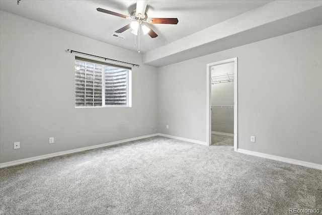8205 Birch Tree Loop, Colorado Springs, CO 80927 - unfurnished bedroom featuring carpet floors, a walk in closet, and ceiling fan