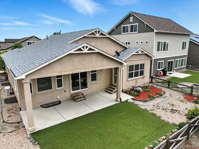 8205 Birch Tree Loop, Colorado Springs, CO 80927 - rear view of property with entry steps, a fenced backyard, a patio, stucco siding, and a gate