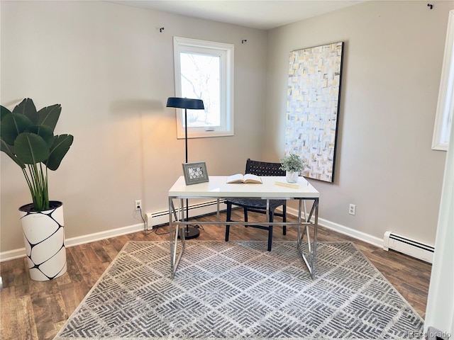 office featuring a baseboard heating unit and hardwood / wood-style flooring