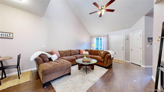 living room with ceiling fan, high vaulted ceiling, and dark hardwood / wood-style flooring