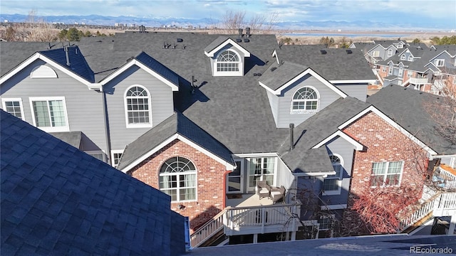 exterior space featuring a deck with mountain view