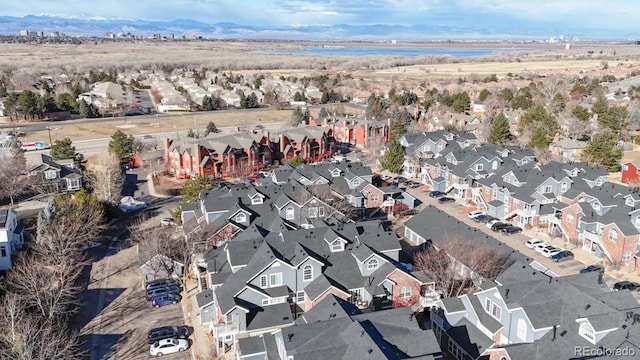 birds eye view of property with a mountain view