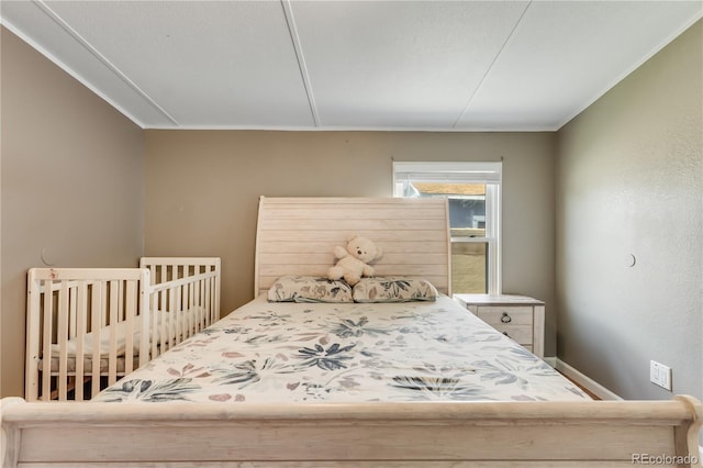 8426 Cook Way, Denver, CO 80229 - bedroom featuring ornamental molding
