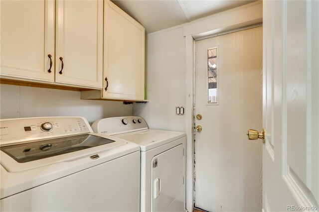 8426 Cook Way, Denver, CO 80229 - laundry area with washing machine and clothes dryer and cabinet space