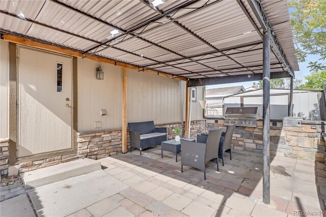 8426 Cook Way, Denver, CO 80229 - view of patio with exterior kitchen