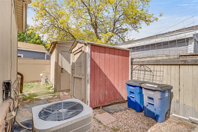 8426 Cook Way, Denver, CO 80229 - view of shed featuring central AC and a fenced backyard