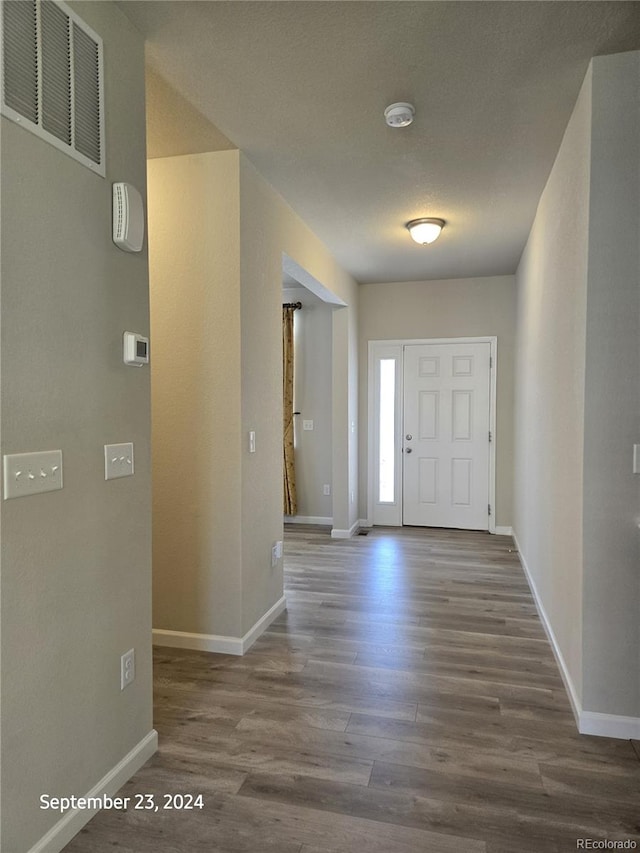 entrance foyer featuring hardwood / wood-style flooring