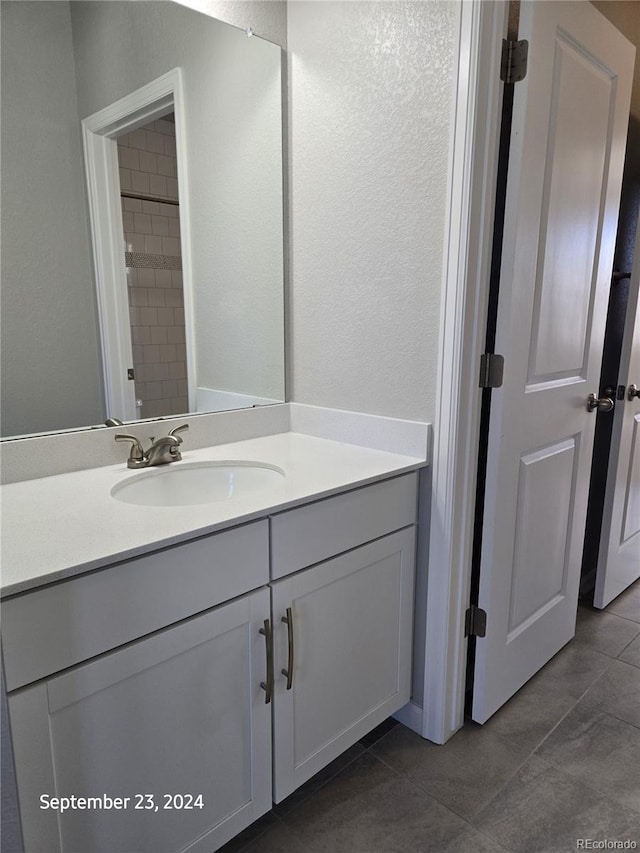 bathroom featuring vanity and tile patterned floors