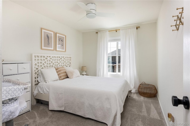 carpeted bedroom featuring a ceiling fan