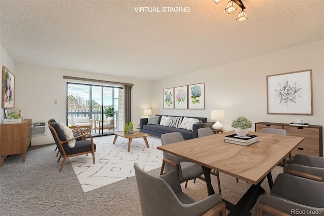 dining area featuring a textured ceiling and light colored carpet