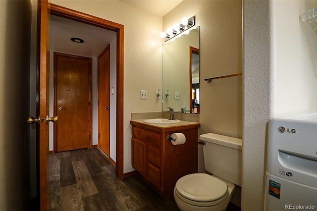 3530 Doolittle Rd, Monument, CO 80132 - bathroom featuring wood finished floors, vanity, and toilet