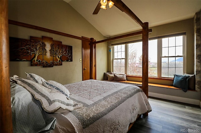 3530 Doolittle Rd, Monument, CO 80132 - bedroom featuring lofted ceiling, multiple windows, wood finished floors, ceiling fan, and baseboards