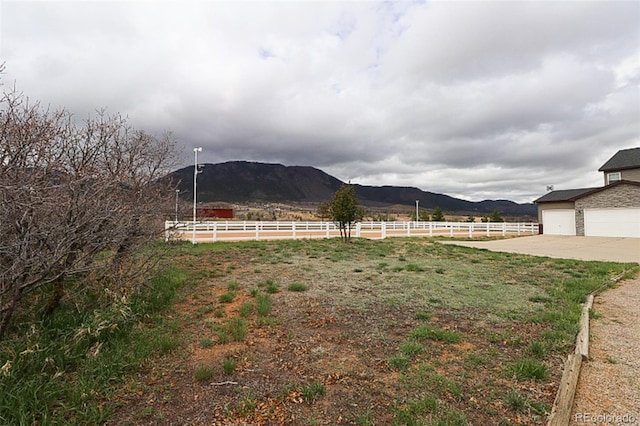 3530 Doolittle Rd, Monument, CO 80132 - view of yard with a mountain view and concrete driveway