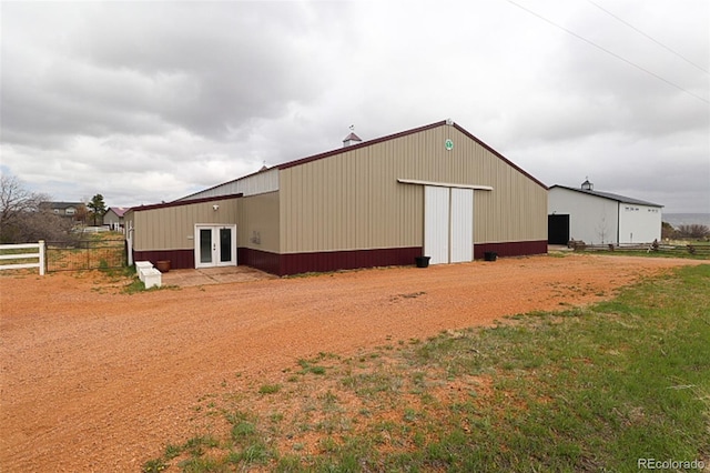 3530 Doolittle Rd, Monument, CO 80132 - view of pole building featuring french doors