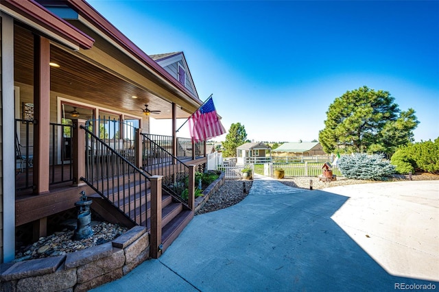 view of patio featuring ceiling fan