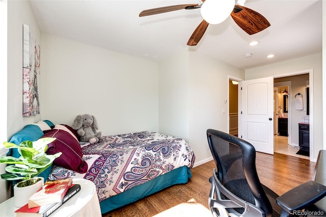 bedroom featuring dark wood-type flooring and ceiling fan