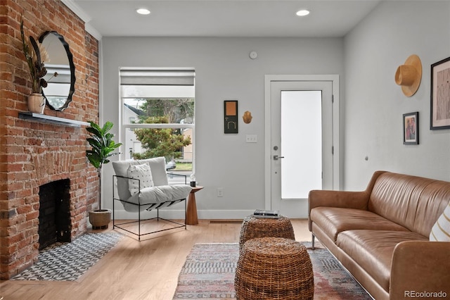 3003 California St, Denver, CO 80205 - living room with wood finished floors, a fireplace, and recessed lighting
