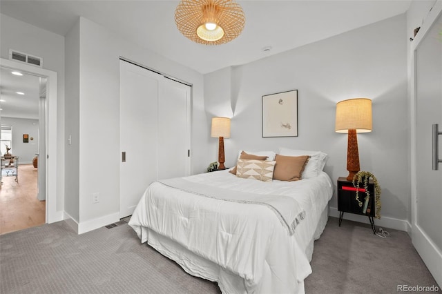 3003 California St, Denver, CO 80205 - bedroom featuring carpet floors, a closet, and recessed lighting