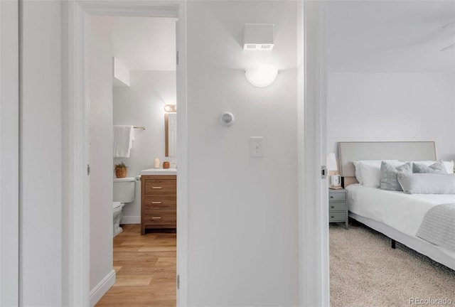 bedroom with light hardwood / wood-style flooring