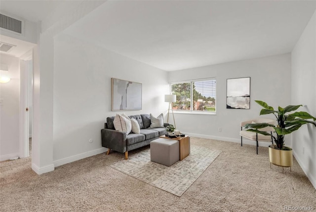 living room with light colored carpet