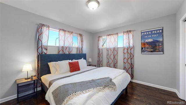 bedroom featuring dark hardwood / wood-style floors