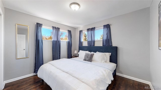 bedroom featuring dark hardwood / wood-style floors