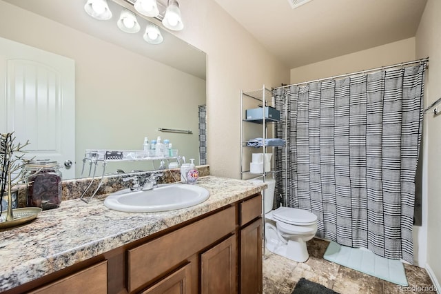 full bathroom with shower / bath combo with shower curtain, toilet, and vanity