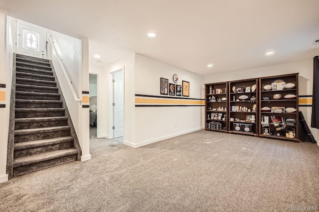 interior space featuring recessed lighting, stairs, baseboards, and carpet floors