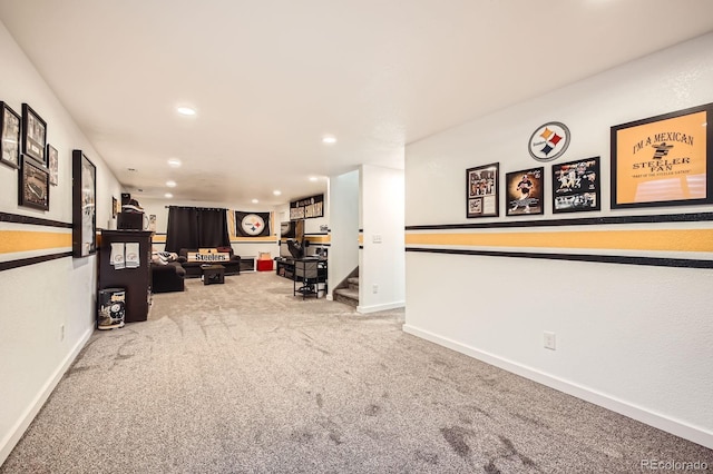 interior space featuring recessed lighting, baseboards, and carpet floors