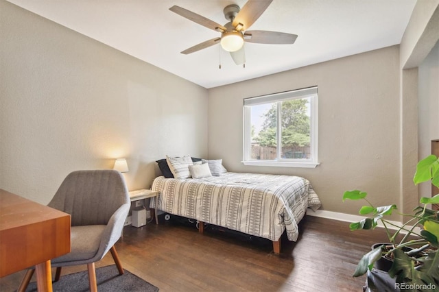 bedroom featuring dark hardwood / wood-style floors and ceiling fan