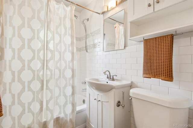 full bathroom featuring shower / tub combo, tasteful backsplash, vanity, tile walls, and toilet