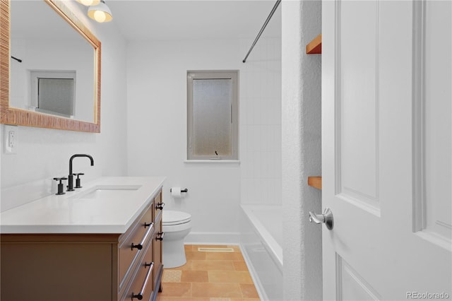 5730 E 19th Ave, Denver, CO 80220 - full bath with toilet, vanity, baseboards, and shower / bathtub combination
