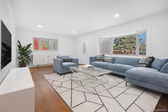 5730 E 19th Ave, Denver, CO 80220 - living room with plenty of natural light, wood finished floors, and recessed lighting